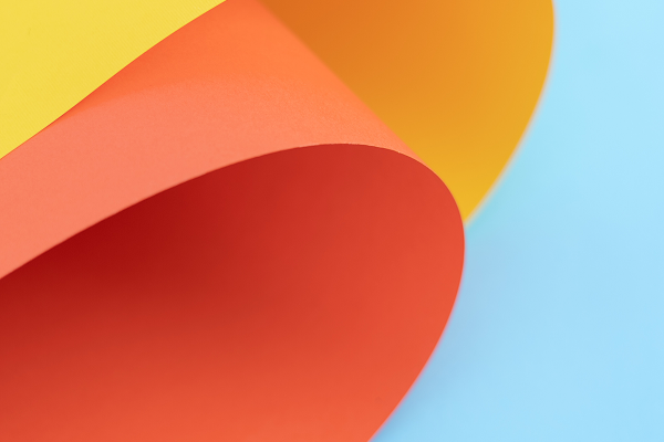 Abstrakt bakgrundsbild i orange, blått och gult